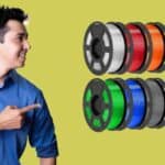 Colorful 3D-printed vases made with the best cheapest bulk PLA filament from Amazon, displayed on a wooden table.