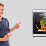 Creality K2 Plus 3D Printer with CFS Multi Color Filament System on a workbench