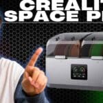 a young white male showing Creality Space Pi X4 Filament Dryer