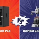 Side-by-side view of Bambu Lab P1S vs A1 Mini 3D printers on a workshop table.