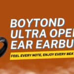 A pair of sleek, black Boytond Ultra Open Ear Earbuds clipped comfortably onto an ear, showcasing their ergonomic design.