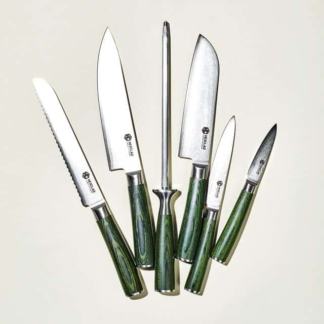 HexClad Damascus steel knife set with 6 pieces showing distinctive pattern and Pakkawood handles