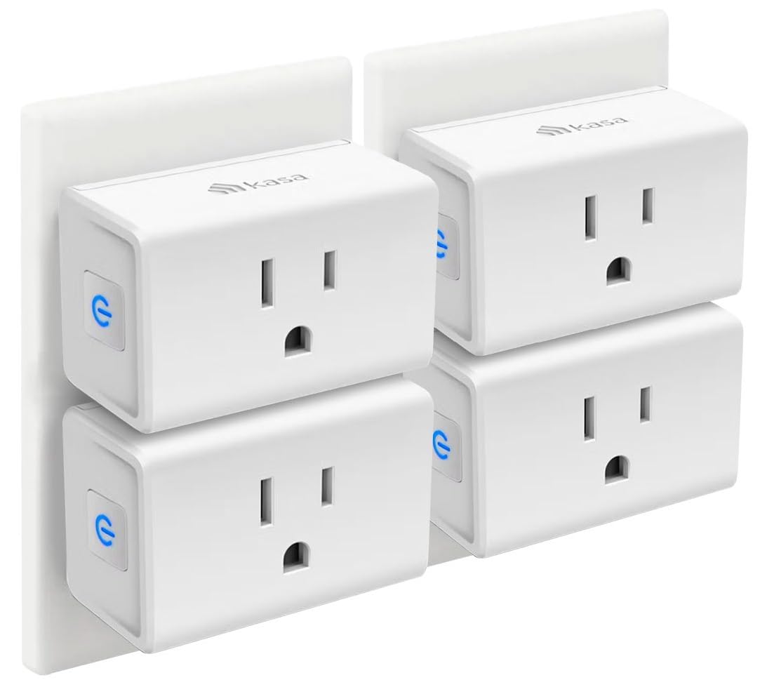 Four white Kasa mini smart plugs showing compact design that doesn't block outlets