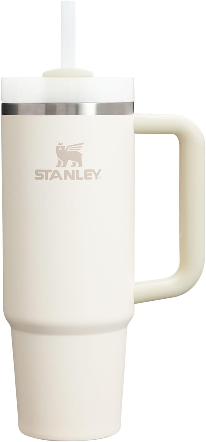 Stanley Quencher 30oz tumbler in cream color with handle and straw showing insulated design