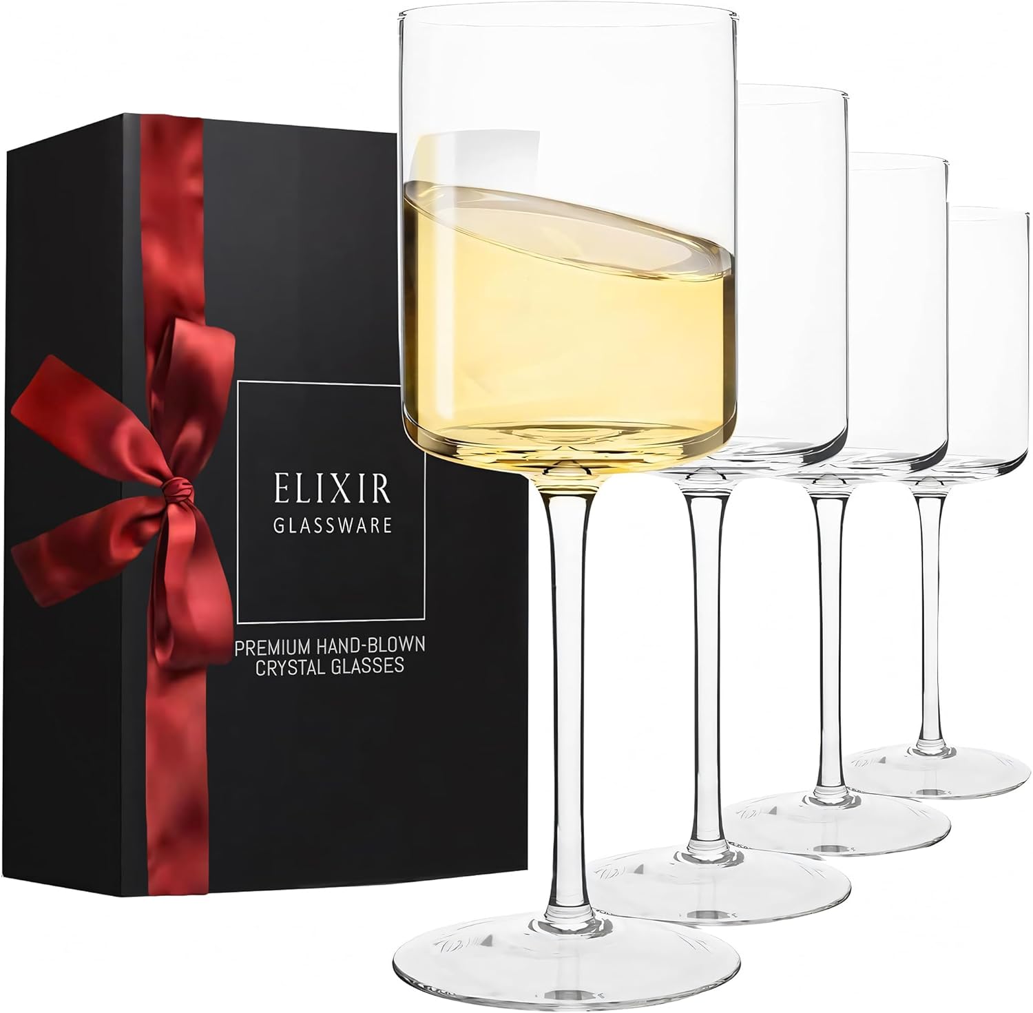 Set of four square-shaped crystal wine glasses with long stems on elegant display