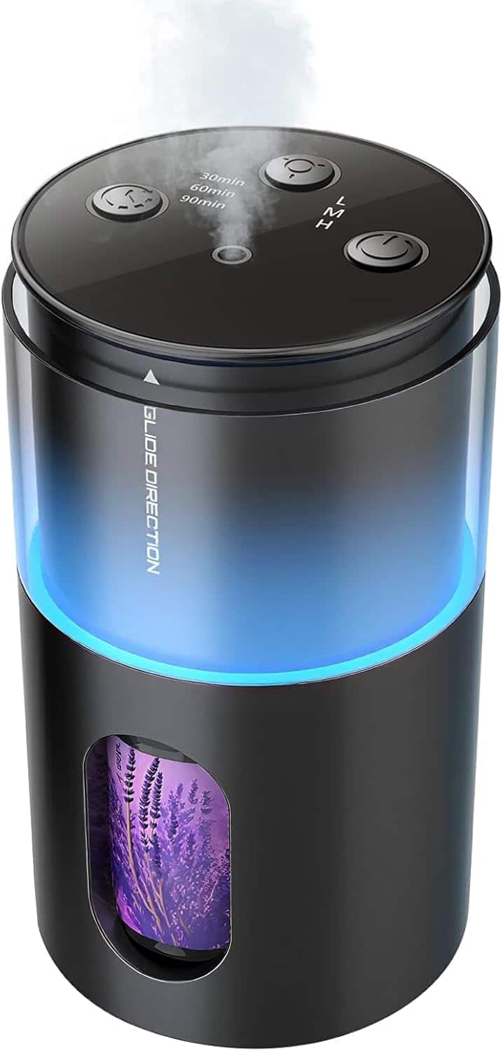 Compact black waterless essential oil diffuser with LED light showing portable battery design