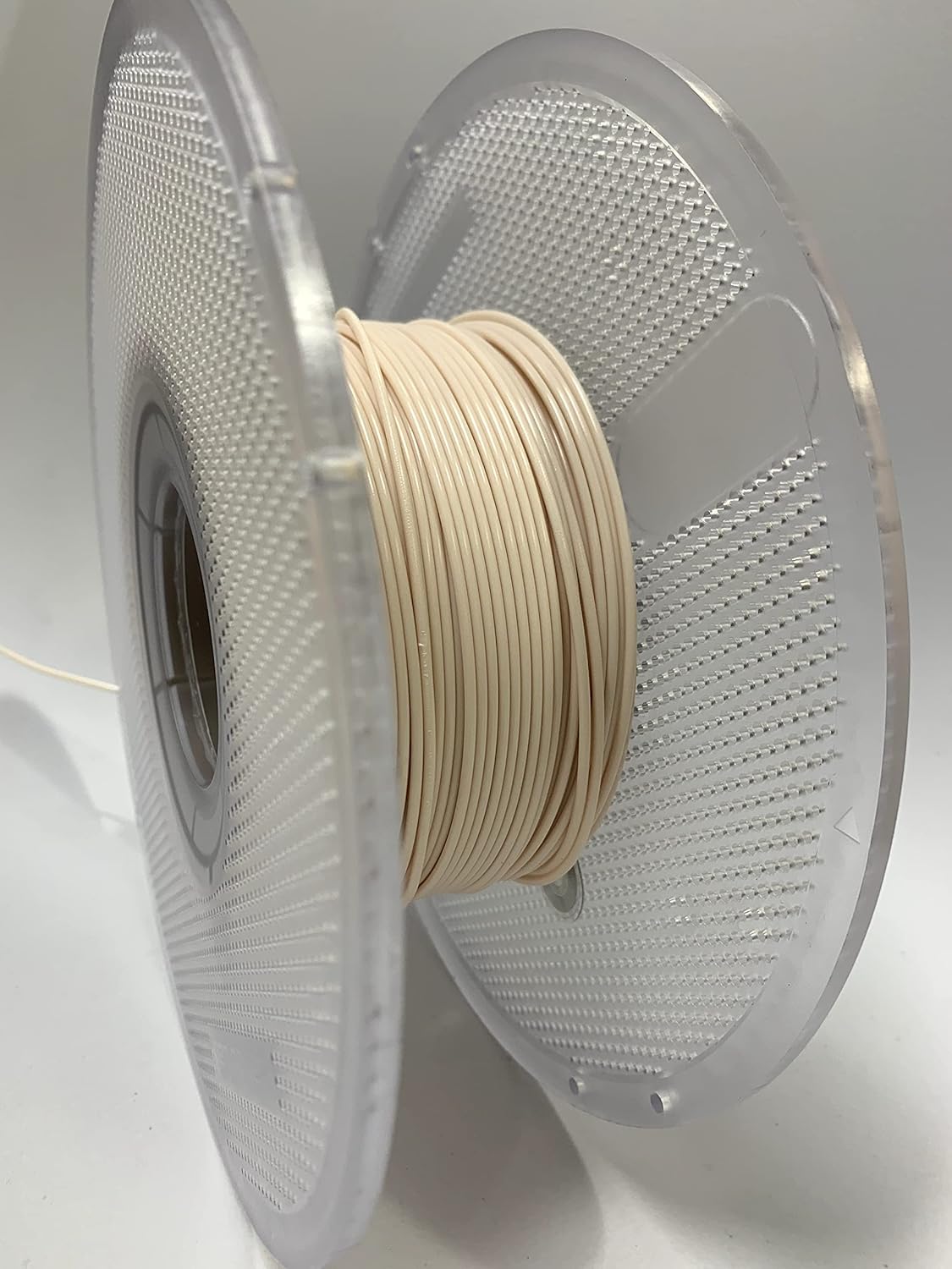 Bambu Lab PLA Filament Beige showing warm neutral tan color ideal for natural-looking 3D prints and decorative items