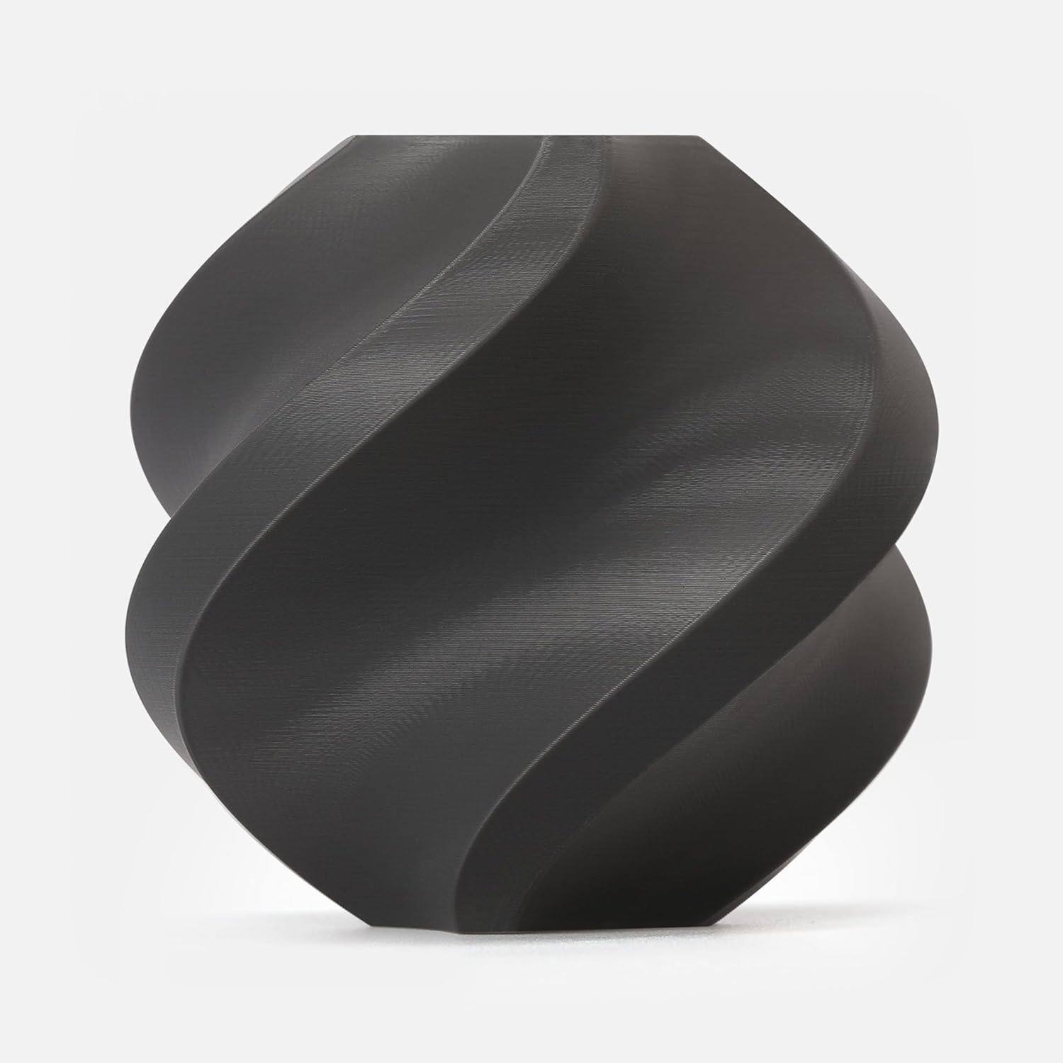 Bambu Lab PLA Filament Dark Gray displaying deep charcoal color perfect for sleek modern 3D printed designs
