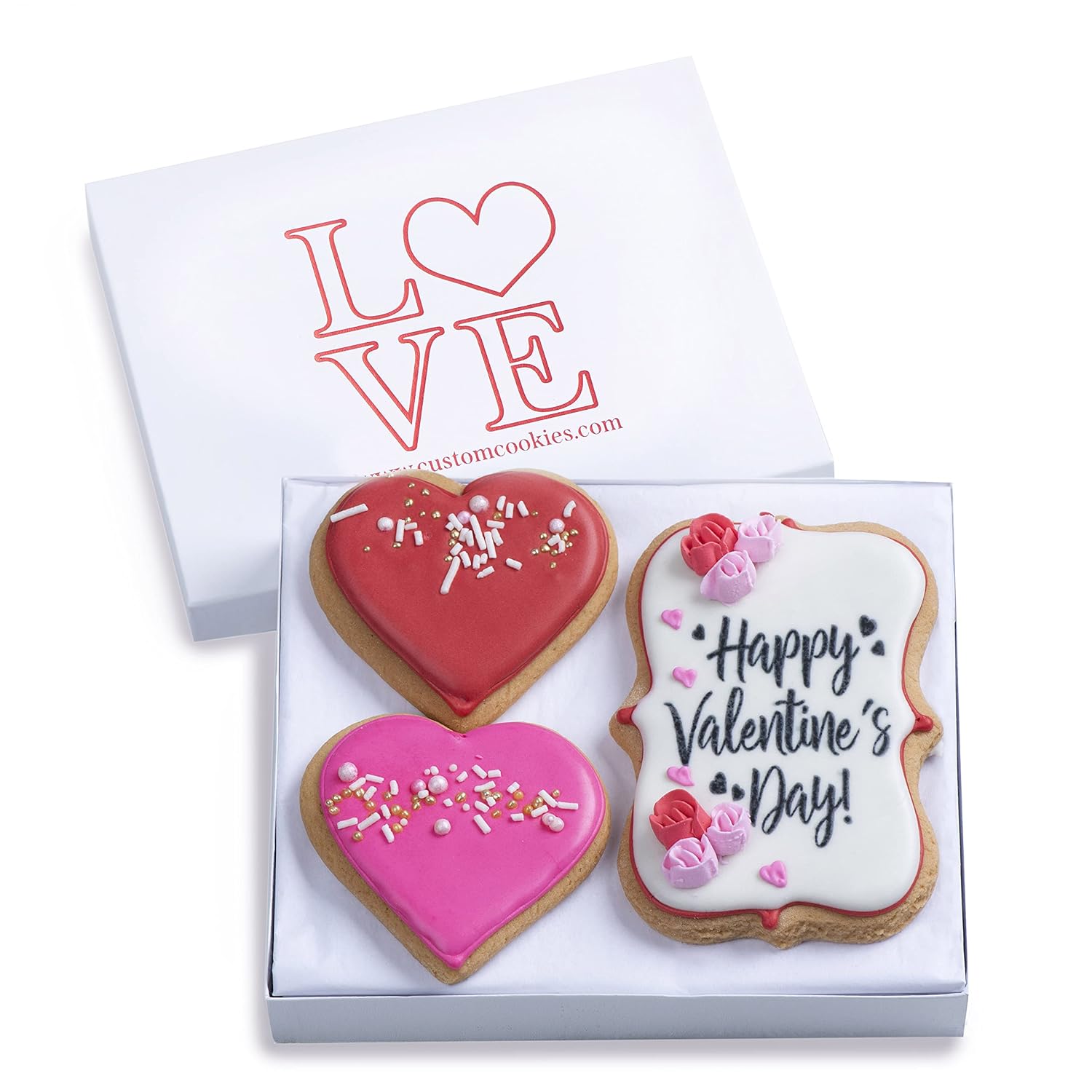 Hand-decorated vanilla sugar cookies in elegant Valentine's Day gift box with romantic designs